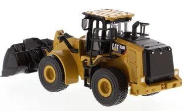 Cargador de ruedas Cat 950M con horquilla para troncos (con cucharón, más 2 postes redondos)